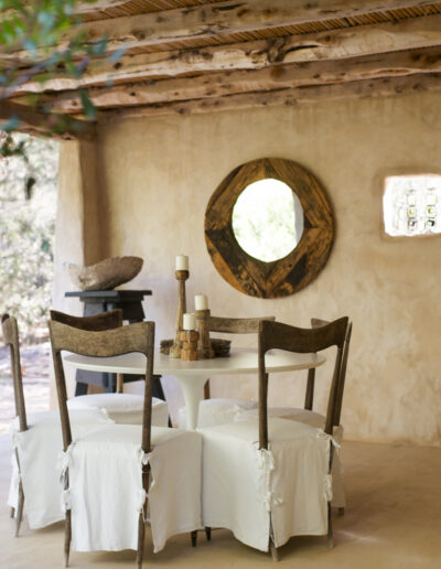 little table for dining in the back terrace of Villa Carlos for rent in formentera